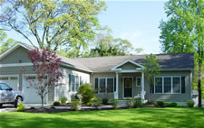 One level ranch home on a full basement foundation with walk-up storage attic area. Front facing two car garage, with side entry access.